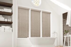 Wall with three windows with EverWood Alternative Wood Blinds installed