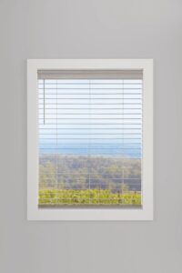 Close up image of a window with EverWood Alternative Wood Blinds
