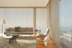 Living room with vintage furniture and window covered with Luminette Privacy Sheers