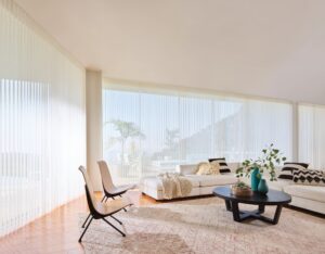 Living room with vintage furniture and window covered with Luminette Privacy Sheers