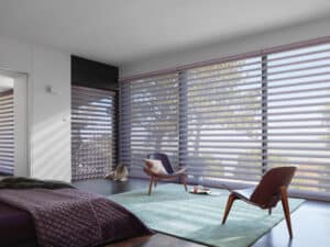 Bedroom with with big window covered with Pirouette® Sheer Shades