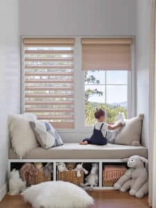 Child playing in room with Pirouette® Sheer Shades
