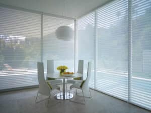 Bright coloured kitchen with windows covered with Silhouette® Window Shadings