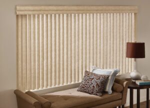 Bench in front of a window with Cadence Soft Vertical Blinds installed