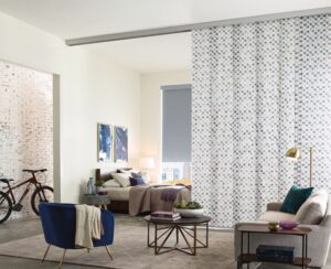 Living room with windows covered with Skyline Gliding Window Panels