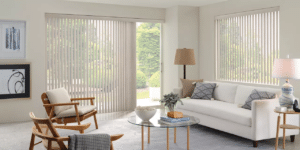 Living room with Cadence Soft Vertical Blinds installed on patio door