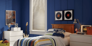 Blue bedroom with window adorned with Modern Precious Metals Venitian Blinds